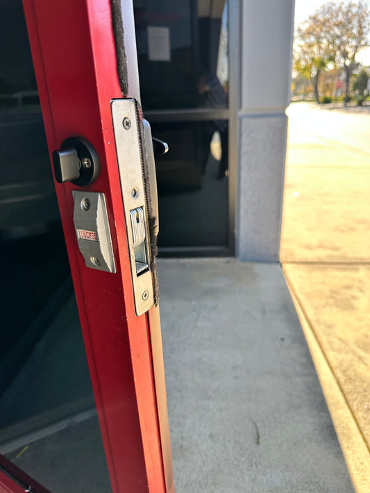 The End of "Drill-and-Damage" Storefront Security: Why 64 Million Adams Rite Locks Need This Upgrade